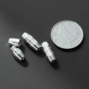 Detail of S925 sterling silver screw clasps for DIY jewelry making with coin scale