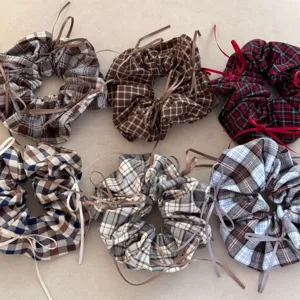 Set of six retro plaid hair scrunchies featuring vintage patterns and ribbon bow details