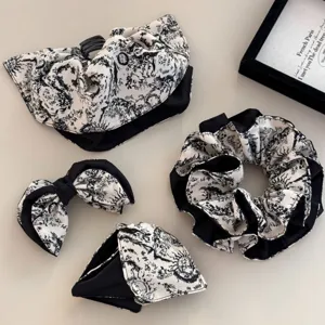 Exquisite French Toile de Jouy print hair accessories including scrunchies and clips