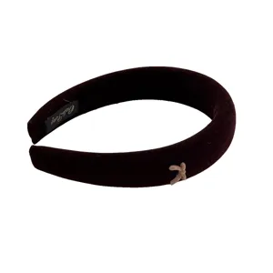 Elegant dark brown velvet padded headband featuring a delicate beige bow detail