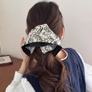 Elegant vintage French style banana hair clip featuring ink floral print for ponytail