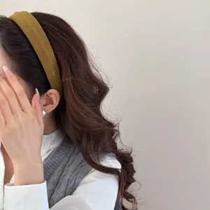 Stylish mustard yellow textured sponge headband for high cranial top hairstyle look