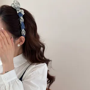 Sweet twisted fabric headband with elegant blue floral pattern for women's daily hair styling