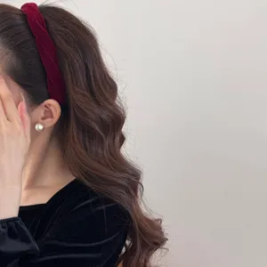 Elegant burgundy velvet braided headband for women, vintage twisted hair accessory.