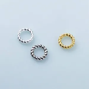 Three S925 sterling silver twisted jump rings in silver, antique, and gold finishes.