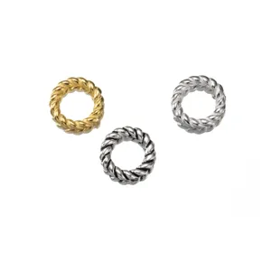 Macro view of S925 silver twisted jewelry rings in gold, silver, and oxidized finishes