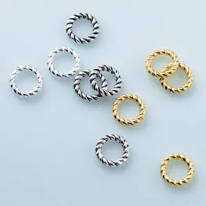 Detailed macro view of S925 sterling silver twisted braided rings for DIY jewelry
