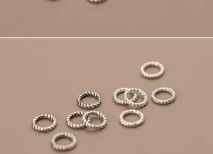 Close-up of S925 Thai silver twisted jump rings for DIY jewelry making accessories