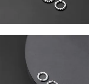 Close-up of S925 sterling silver twisted closed jump rings for jewelry making