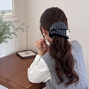 Elegant dark plaid retro scrunchie for low ponytail and bun hairstyles