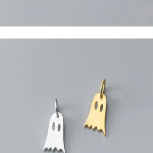 Close-up of S925 silver ghost pendants in gold and silver for DIY jewelry crafts