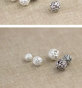 Detailopname van S925 Thais zilveren Pixiu kralen met reliëf voor handgemaakte sieraden.
