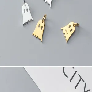 Close-up of S925 silver ghost-shaped pendant charms in gold and silver finishes