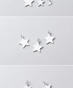 Primer plano de dijes de estrella de plata de ley S925 para joyería artesanal DIY