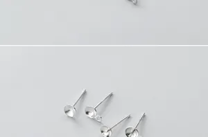Detailed view of S925 sterling silver earring stud components with pearl bowl settings for DIY.