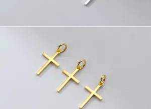 Detailed view of three gold-plated cross charms for DIY jewelry making projects