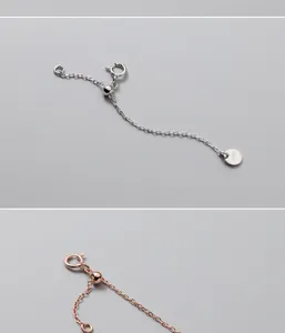 Macro detail of S925 silver extension chain with adjustable silicone bead and ring clasp
