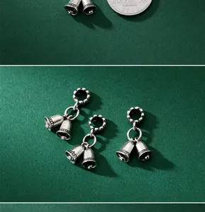 Vue rapprochée de breloques clochettes en argent 925 antique de 6mm pour DIY