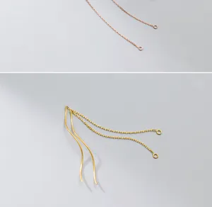 Dettaglio di componenti per orecchini in argento S925 con catene e onde per gioielli DIY.