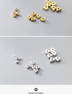 Detail of gold and silver S925 silver plated triangle spacer beads for DIY jewelry