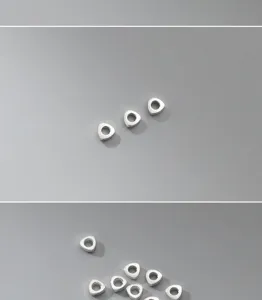 Close-up of S925 sterling silver triangular geometric spacer beads for DIY jewelry