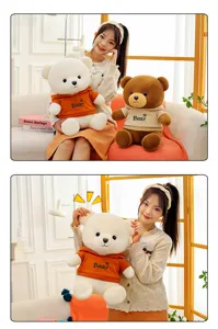 Detail of a girl holding a cute white plush teddy bear wearing an orange hoodie