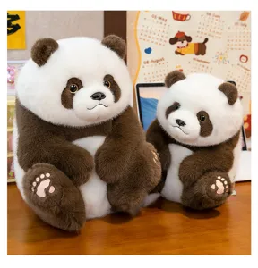Realistic panda plush toys in black and brown seated on a wooden desk for home decor
