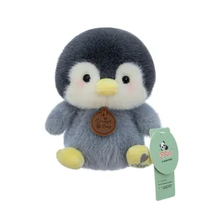 Adorable gray and white plush penguin stuffed animal toy with a leather neck tag.