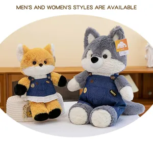 Detailed view of cute fox and wolf plush toys wearing denim overalls and skirts