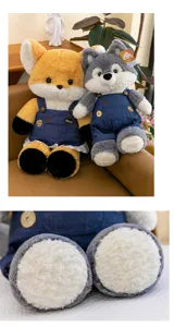 Close-up of soft textures on fox and wolf plush dolls wearing denim overalls