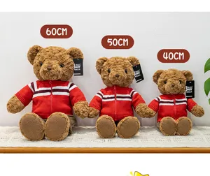 Cute teddy bear plush toy in red knitted sweater, soft stuffed doll gift for kids and girlfriends.