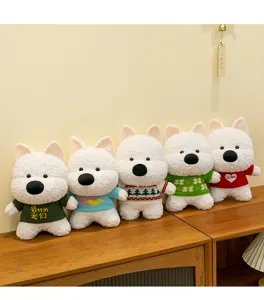 Close-up showing a row of adorable fluffy Westie plush toys wearing colorful knitted sweaters