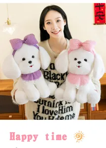 Asian model holding two cute white plush toy dogs with purple and pink bows