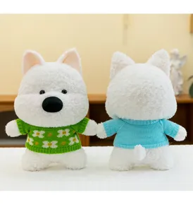 Detail view showing front and back of adorable Westie plush dogs wearing knitted sweaters