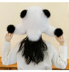A detailed back view of a plush panda hat with thickened ear flaps and soft pom-poms