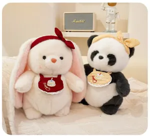 Pair of cute plush panda and bunny stuffed animals wearing colorful headbands and bibs.