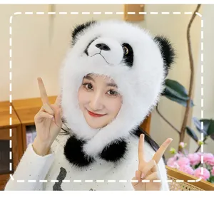 Detailed view of an Asian model wearing a fluffy plush panda hat with ear flaps.
