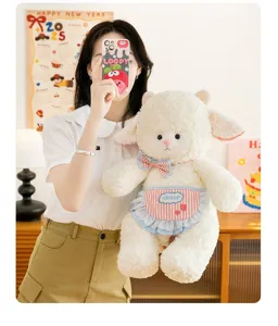 Adorable white sheep plush toy doll with a pink striped apron and a cute bow tie