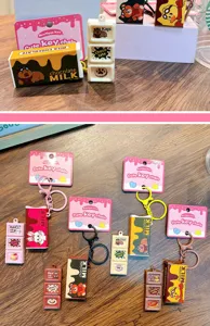 Detail of chocolate bar fidget keychains with cute animal characters in various colors.