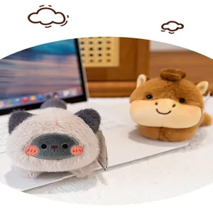 Detailed view of two cute plush magnets featuring a cat and a capybara animal design