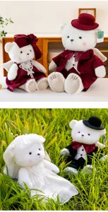 Wedding couple teddy bears featuring angel wings and plush velvet bridal outfits