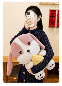 Lifestyle shot of a large pink and white cheese dog plush toy held by a person at home