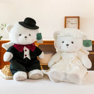 Adorable wedding teddy bear couple plush toys in tuxedo and elegant bridal gown