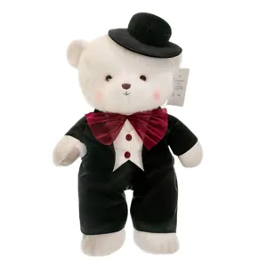 Cute white wedding groom teddy bear plush doll wearing a black tuxedo and red bowtie
