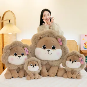 Collection of four adorable lion plush toys in varying sizes with a smiling model