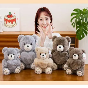 Group of sitting plush teddy bears with heart designs for gifts