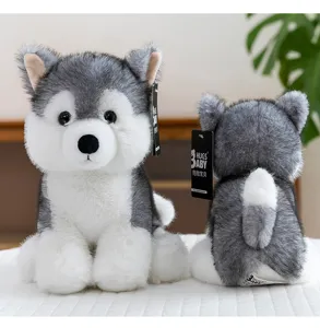 Vistas frontal y trasera de un suave peluche de perro husky gris y blanco para niños