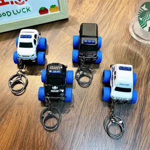 Set of 4 mini alloy pull-back police car model keychains with blue big off-road wheels