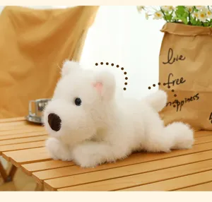 Macro view of a soft white plush puppy toy resting on a rustic wooden table