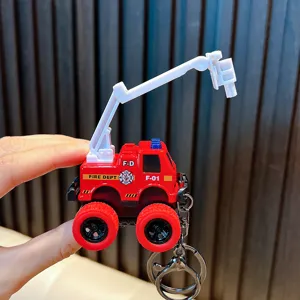 Mini red pull-back fire truck keychain toy model with a functional extendable crane arm